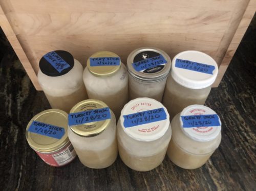 how to make and freezer turkey stock from turkey bones - labeled glass jars from freezer